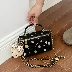 Sweet black polka dot handbag with bow charm, stylish chain shoulder box bag for women.