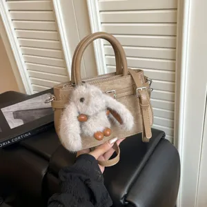 Retro suede handbag with cute bunny plush charm, stylish top handle tote bag for women