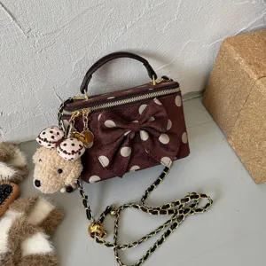 Korean sweet polka dot crossbody bag with bow and cute bear charm, stylish top handle box bag.