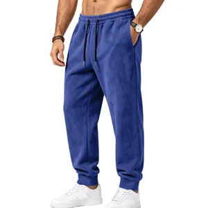 Men's blue fleece sweatpants featuring an elastic drawstring waist and cuffed ankles for comfort.