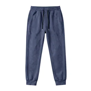 Detail view of men's suede air layer fleece sweatpants with elastic drawstring waist.