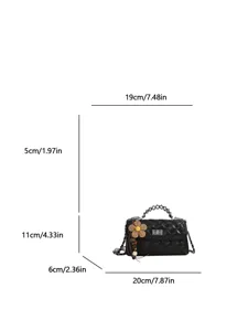 Black quilted chain shoulder bag with elegant design, compact size, and chic flower charm.