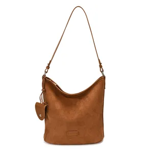 Brown suede shoulder bag for women, retro hobo bucket bag with stylish strap and chic charm.