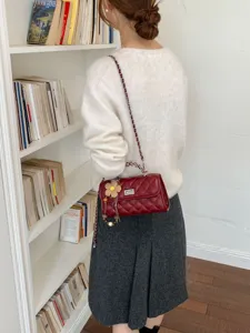Red quilted crossbody bag for women retro shoulder bag with chain strap and flower pendant chic