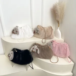 Plush shoulder bag for women, cute rabbit charm cloud bag, soft fluffy crossbody handbag.