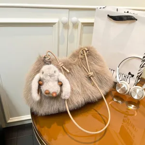 Khaki plush shoulder bag, soft faux fur crossbody bag with cute fluffy rabbit keychain charm.