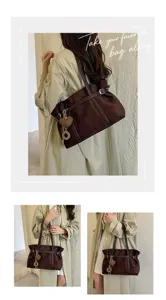 Retro Wildleder Umhängetasche Detailansicht mit eleganter Textur, grossem Stauraum und Design.