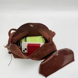 Brown suede large capacity shoulder tote bag detail view showing spacious interior capacity.