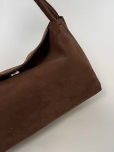 Brown suede shoulder bag minimalist casual vintage hobo tote bag daily fashion accessory.