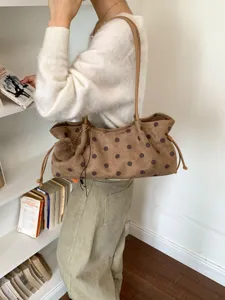 Stylish brown polka dot shoulder bag, large capacity casual tote purse with chic pom-pom.