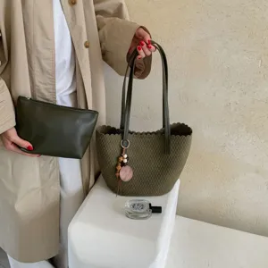Woven bucket bag set for women, stylish shoulder handbag with matching pouch and pendant.