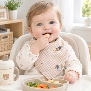 Detailed view of baby cotton gauze triangular bib in plaid print, soft and skin-friendly.