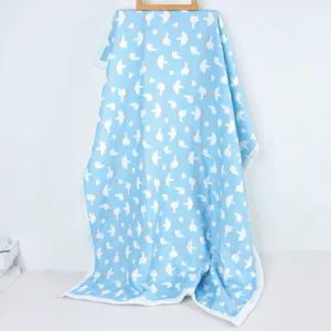 Four-layer thickened baby cotton gauze blanket with cute white goose pattern, soft and cozy.