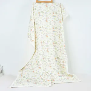 Close-up view of the four-layer thickened baby blanket featuring cute cartoon duck pattern.