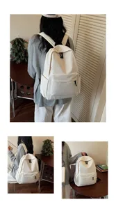 Detail view of simple large capacity canvas backpack, versatile daily school bag for students.