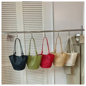 Stylish hollow woven bucket bag, multi-color casual shoulder tote bag for summer daily commute.