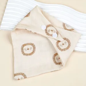 Baby cotton gauze bib close up, soft double layer print triangle bandana drool cloth detail