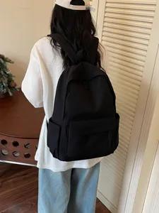 Simple large capacity black canvas school backpack for students, casual daily casual bag.