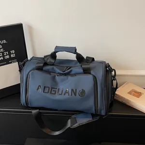 Large capacity PU gym duffel bag for sports, travel, and swimming with shoe compartment.