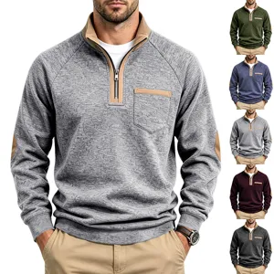 Detailed view of mens quarter zip fleece sweatshirt featuring contrast chest pocket and elbow patch.