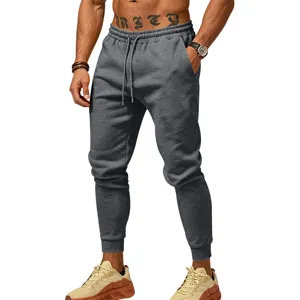 Men's casual loose fit sweatpants with pockets, comfortable dark grey joggers for daily wear.