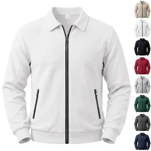 Men's waffle knit zip jacket detail, textured fabric and metal zipper close-up view.