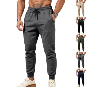 Pantaloni da jogging casual da uomo con coulisse in vita, tasche con zip e polsini elasticati.