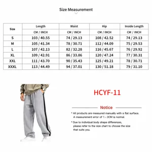 Detailed view of heavyweight fleece-lined men's sweatpants with side stripe and drawstring.