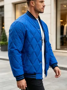 Men's royal blue quilted bomber jacket with snap buttons and striped ribbed trim.