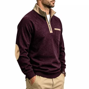 Detail view of men's quarter-zip fleece sweatshirt with contrast collar and elbow patches.