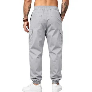 Men's grey casual cargo pants with multiple pockets, elastic waist and cuffed hem.
