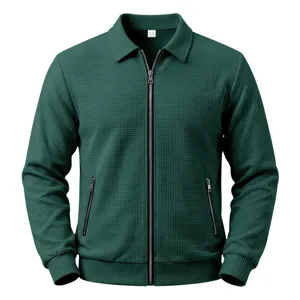 Men's green waffle knit jacket with full zip closure, lapel collar, and zipper pockets for casual wear.