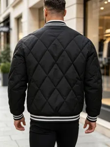 Men's black quilted bomber jacket with striped ribbing, warm casual streetwear detail.