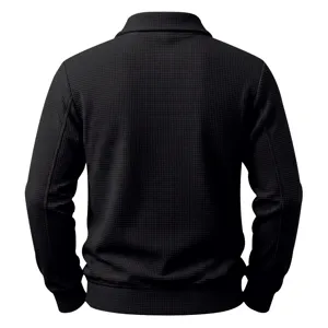 Detailed back view of black waffle knit zip jacket showcasing textured fabric design.