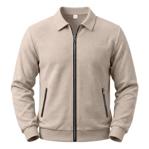 Men's waffle knit zip-up jacket detail, casual lapel outerwear with zippered pockets.