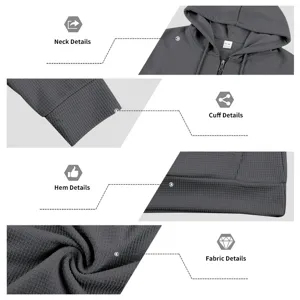 Men's waffle half-zip hoodie detail view showcasing collar, cuffs, hem and fabric texture.