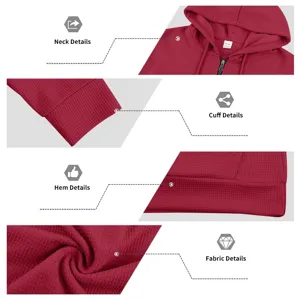 Men's waffle knit half-zip hoodie detail view showing comfortable hood, cuff and fabric.