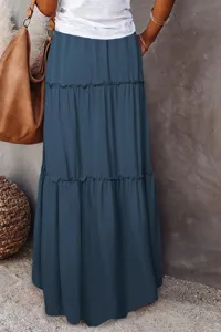 Detailed view of the elegant blue tiered maxi skirt featuring ruffled layers and high waist design.