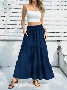 Casual tiered maxi skirt for women, high waist with drawstring and convenient pockets.