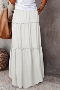 Women's white layered maxi skirt with high waist and ruffles for casual summer daily wear.