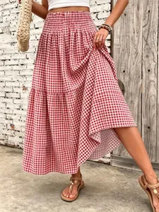 Red gingham tiered maxi skirt with elastic high waist, perfect summer vacation style.