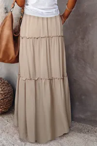 Detail view of a boho tiered maxi skirt with lettuce hem, high waist, and elegant ruffle layers.