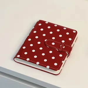Red polka dot mini photocard binder and cute polaroid storage album detail display.