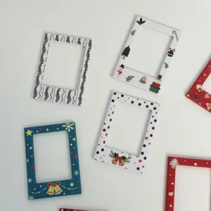 Detailed view of Christmas magnetic photo frames for mini polaroid pictures and small cards.