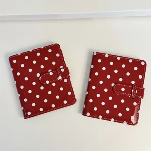 Vintage red polka dot photocard binder album for mini polaroids and cute kpop cards storage.