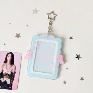 Acrylic photocard holder detail shot, cute angel wings design for 3 inch polaroid and id photos.