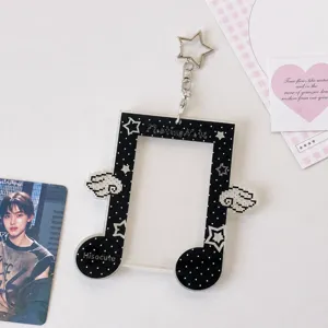 Acrylic star photocard holder featuring cute music note design and decorative pendant for fans.