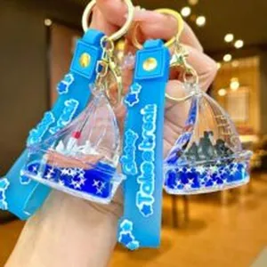Cute liquid drift bottle keychain creative floating ship bag pendant car key accessory
