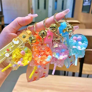 Cute luminous unicorn gumball keychain liquid floating charm bag pendant car key ring gift