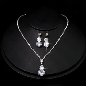 Elegant crystal rhinestone wedding necklace and earrings jewelry set for women bridal party details.